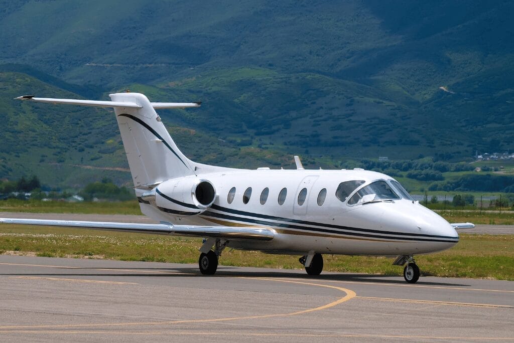 Beechcraft aircraft parked on runway ready for takeoff